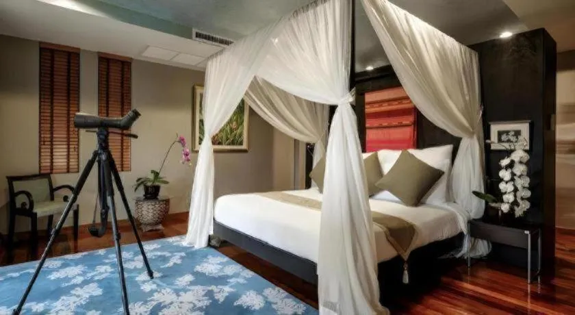 Bed in Baan Souchada Resort & Spa