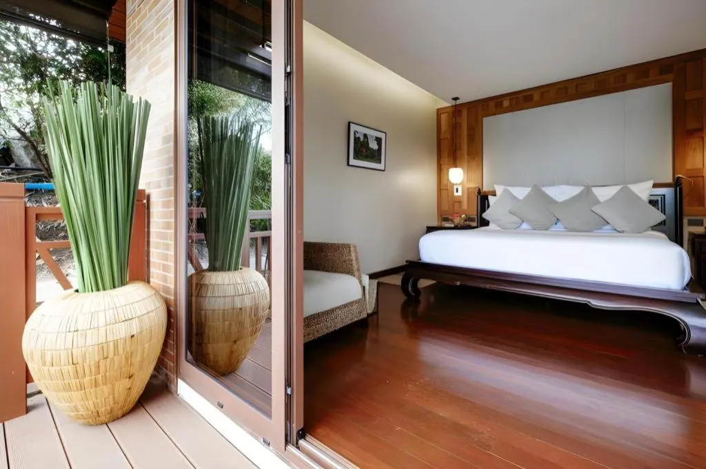 Bed in Baan Souchada Resort & Spa