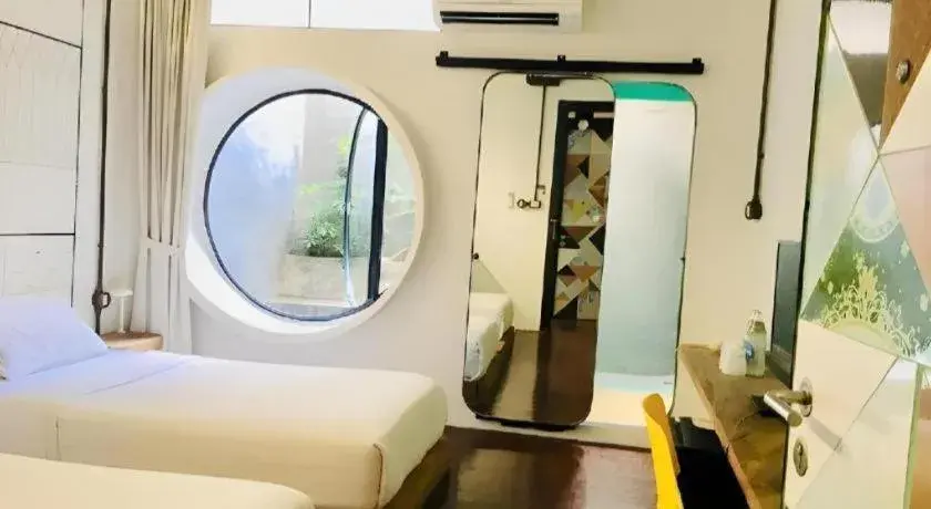 Bed in The Artel Nimman Hotel Bed in The Artel Nimman Hotel