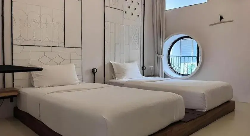 Bed in The Artel Nimman Hotel Bed in The Artel Nimman Hotel