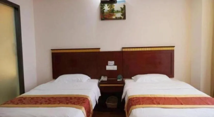 Bed in GreenTree Inn Shanghai Minhang Development Zone Subway Station Business Hotel