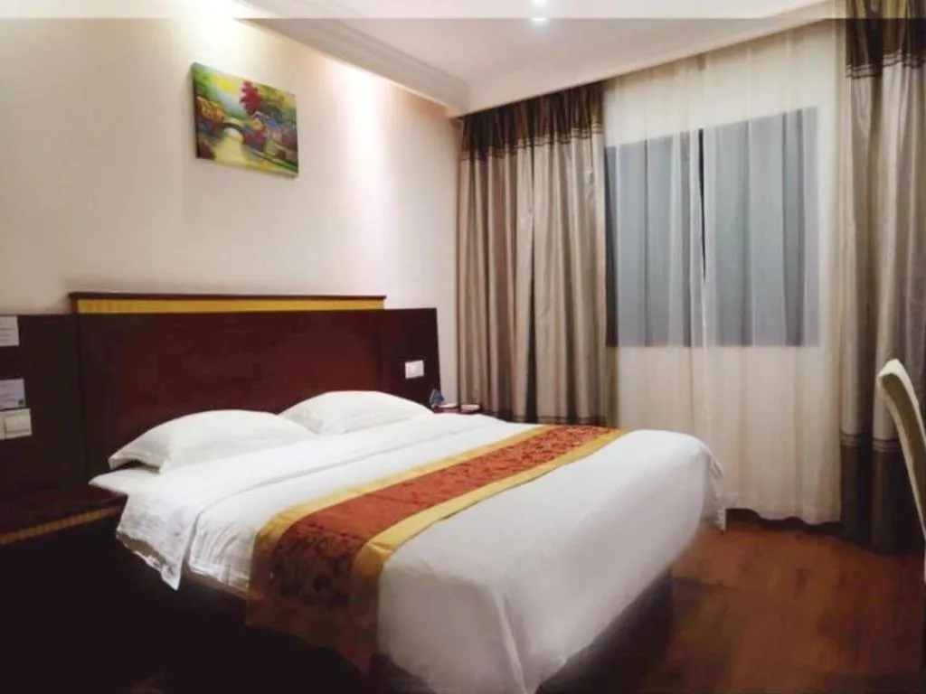 Bed in GreenTree Inn Shanghai Minhang Development Zone Subway Station Business Hotel