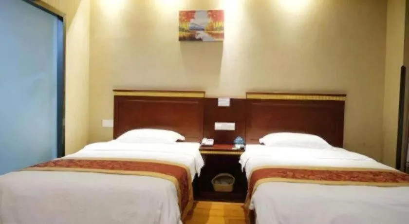 Bed in GreenTree Inn Shanghai Minhang Development Zone Subway Station Business Hotel
