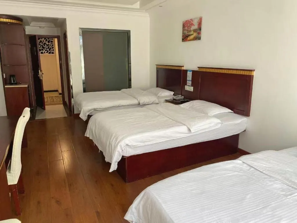 Bed in GreenTree Inn Shanghai Minhang Development Zone Subway Station Business Hotel