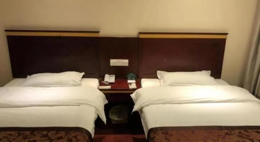 Bed in GreenTree Inn Shanghai Minhang Development Zone Subway Station Business Hotel
