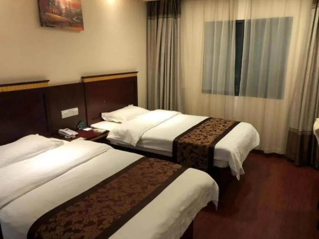 Bed in GreenTree Inn Shanghai Minhang Development Zone Subway Station Business Hotel