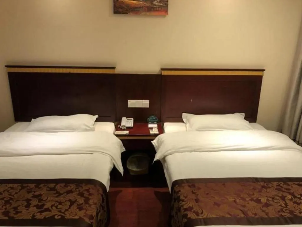 Bed in GreenTree Inn Shanghai Minhang Development Zone Subway Station Business Hotel