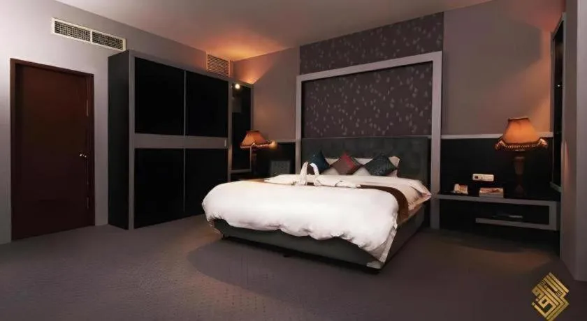 Bed in Raz Hotel and Convention