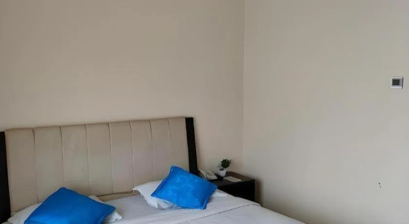 Bed in Raz Hotel and Convention