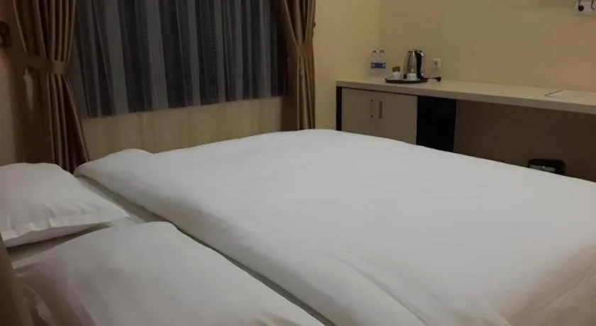 Bed in Raz Hotel and Convention