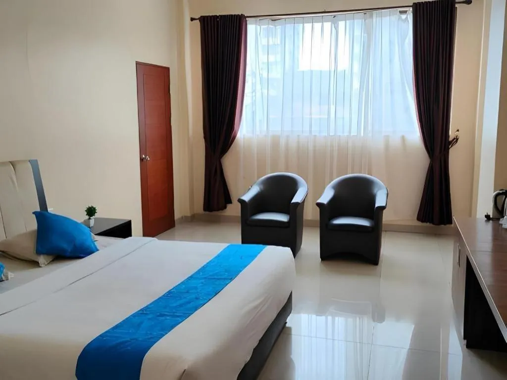 Bed in Raz Hotel and Convention