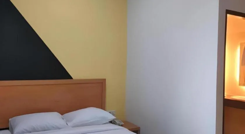 Bed in Raz Hotel and Convention