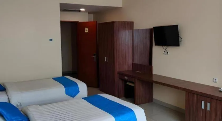 Bed in Raz Hotel and Convention