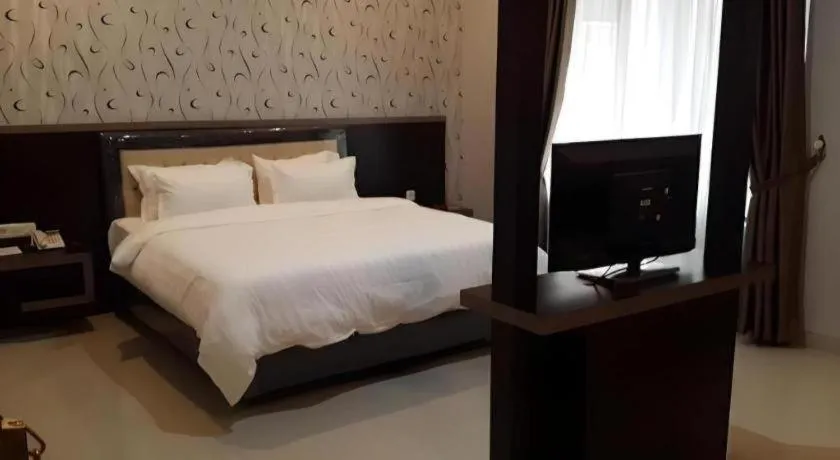 Bed in Raz Hotel and Convention