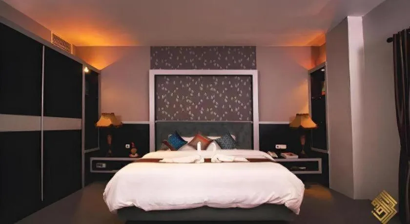 Bed in Raz Hotel and Convention