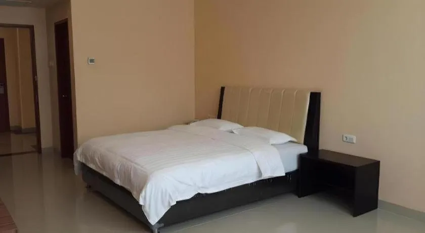 Bed in Raz Hotel and Convention