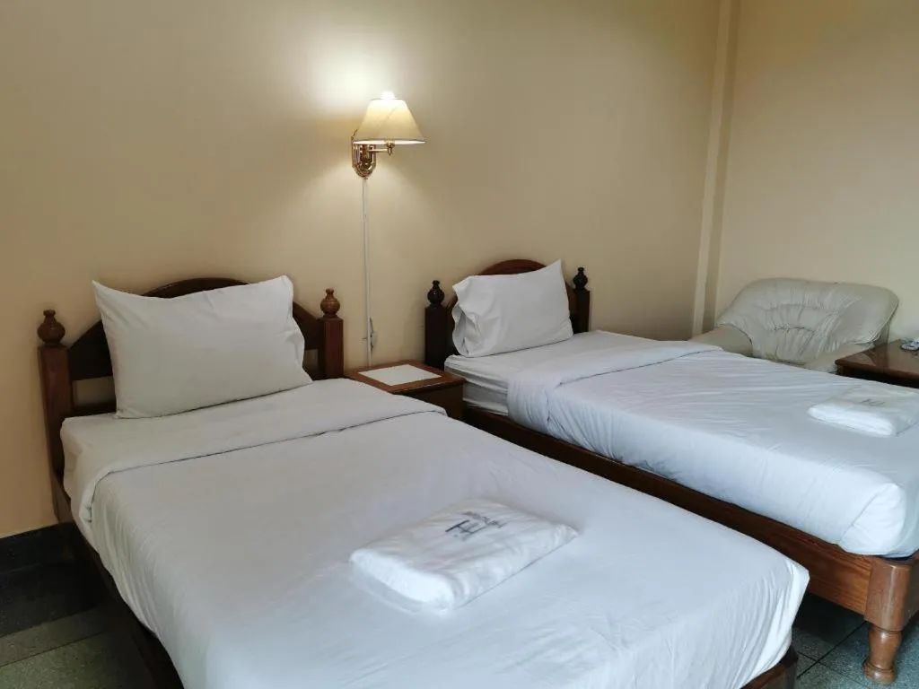 Bed in Hihotel Saraburi