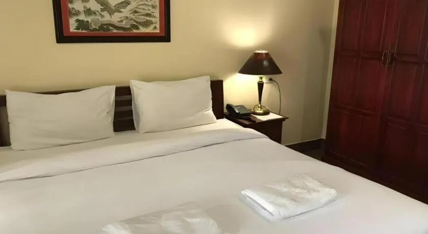 Bed in Hihotel Saraburi