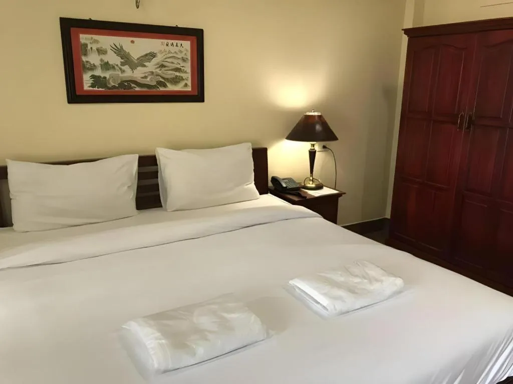 Bed in Hihotel Saraburi