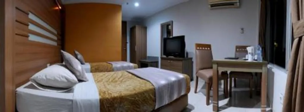Bed in Hotel Senen Indah Syariah