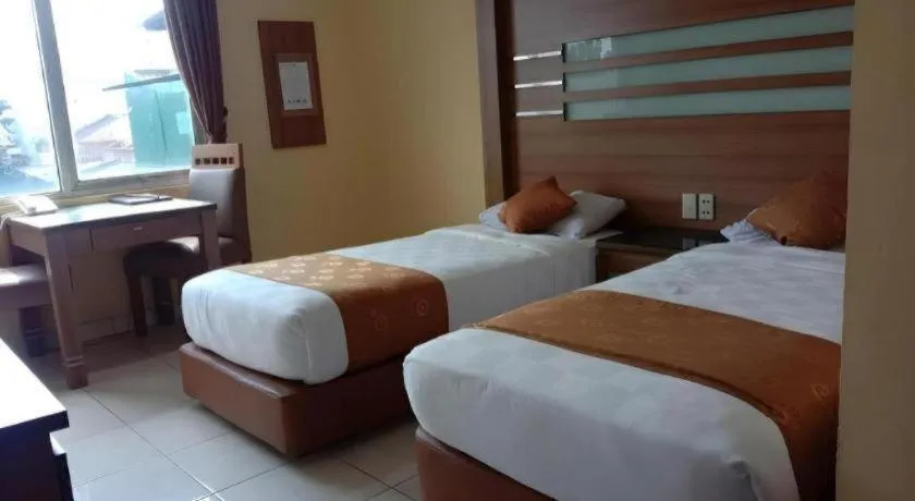 Bed in Hotel Senen Indah Syariah