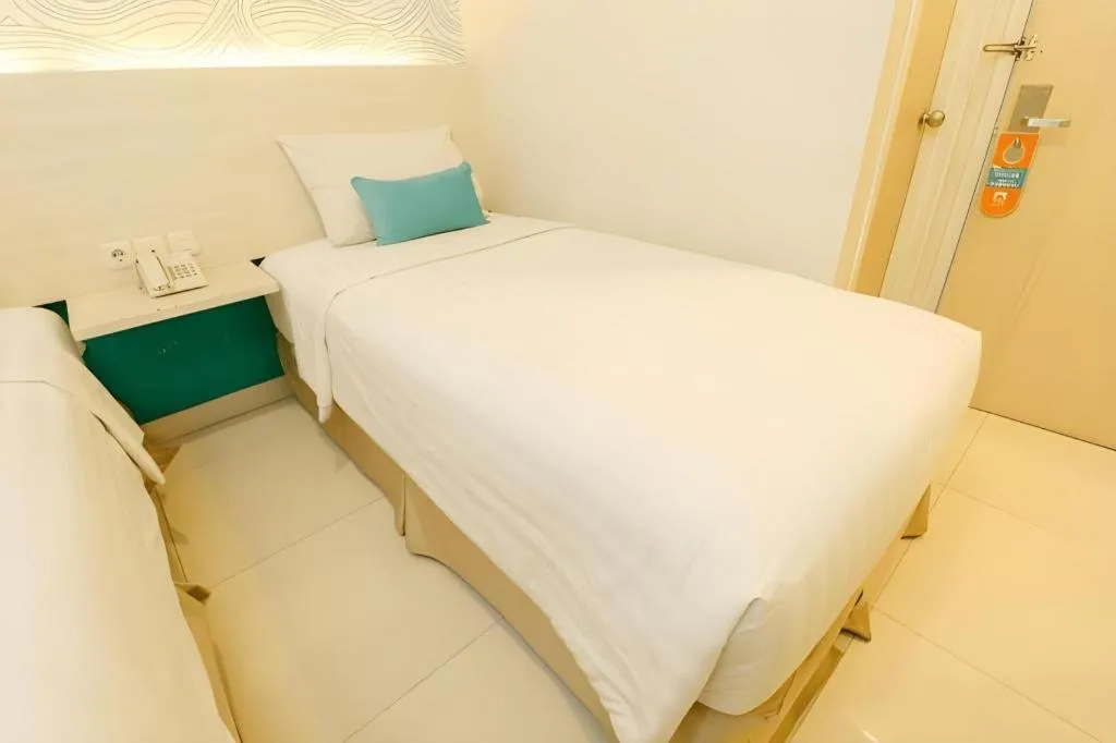 Bed in Makassar Beach Inn