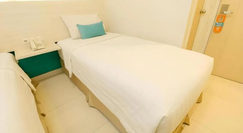 Bed in Makassar Beach Inn