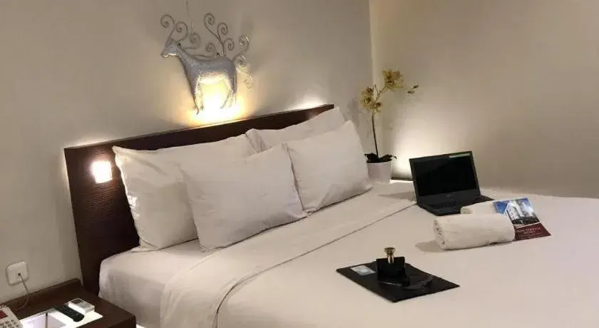 Bed in Burza Hotel Lubuk Linggau Bed in Burza Hotel Lubuk Linggau