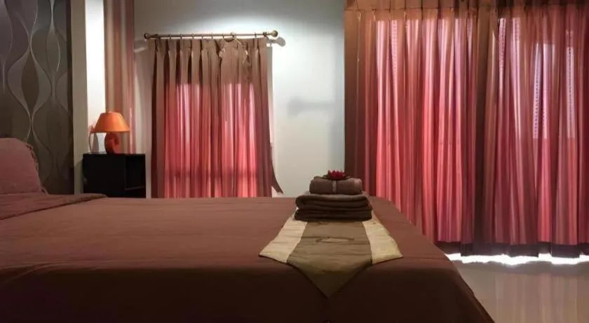 Bed in Tontalay Hotel