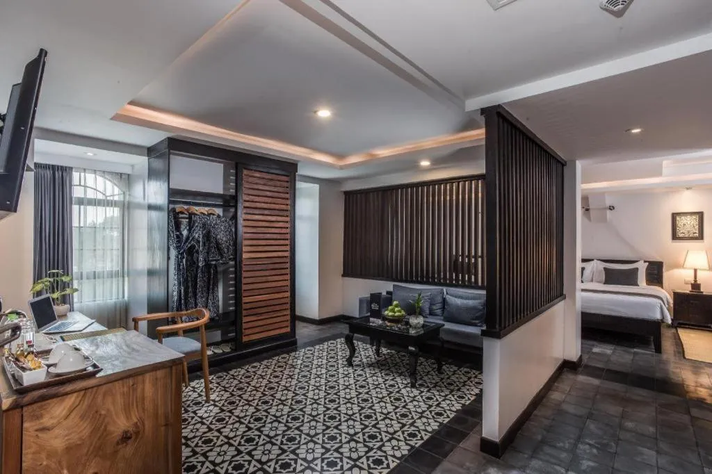 Bed in The Grand Cyclo Boutique Suite & Spa