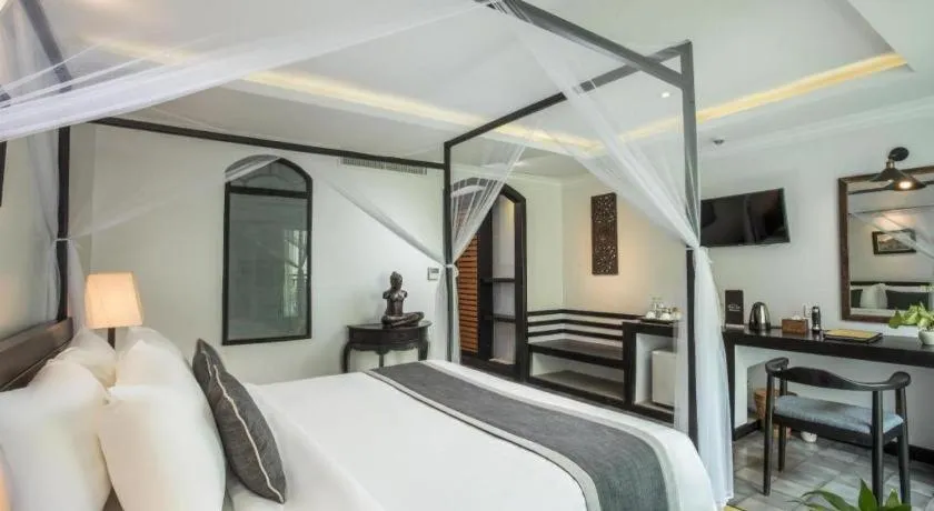Bed in The Grand Cyclo Boutique Suite & Spa