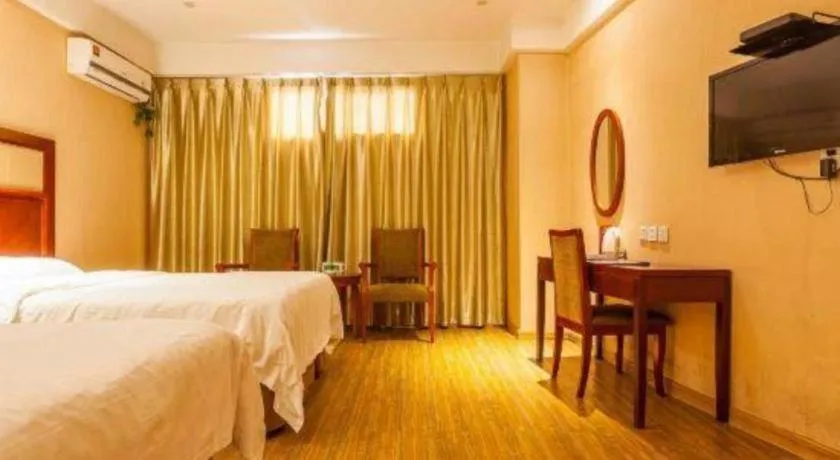 Bed in GreenTree Inn Kunshan Shimao Plaza Business Hotel