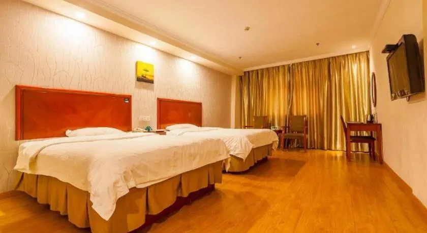 Bed in GreenTree Inn Kunshan Shimao Plaza Business Hotel