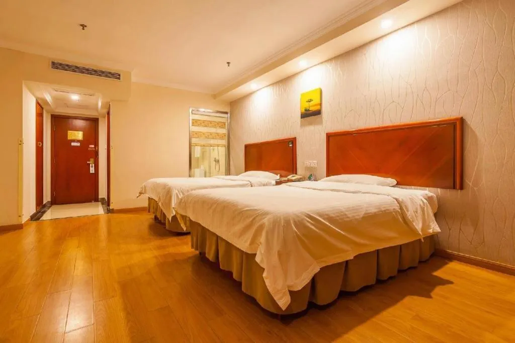 Bed in GreenTree Inn Kunshan Shimao Plaza Business Hotel