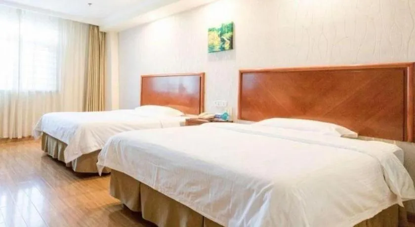 Bed in GreenTree Inn Kunshan Shimao Plaza Business Hotel
