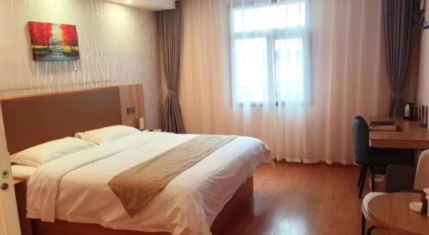Bed in GreenTree Inn Kunshan Shimao Plaza Business Hotel