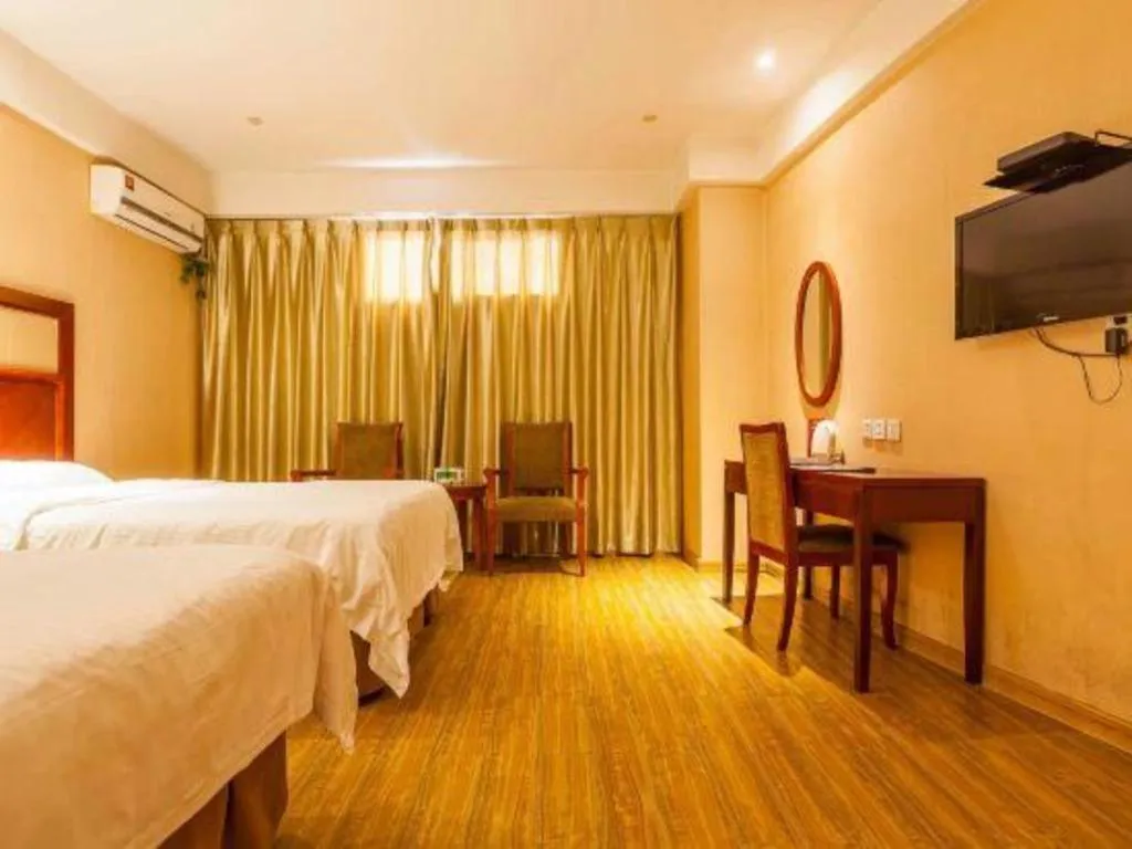Bed in GreenTree Inn Kunshan Shimao Plaza Business Hotel