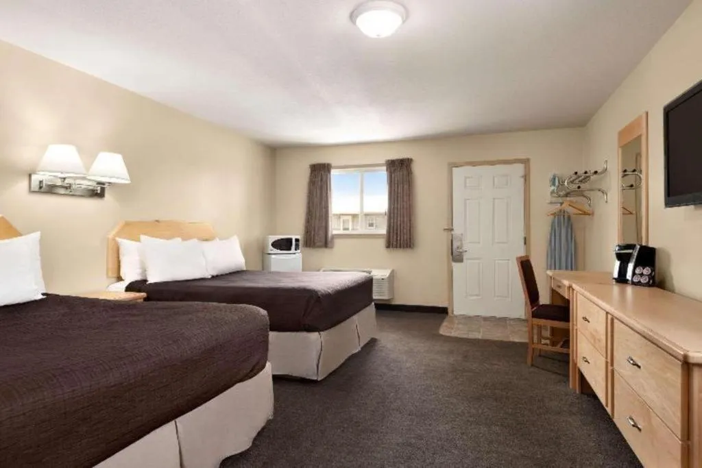 Bed in Thriftlodge Moose Jaw