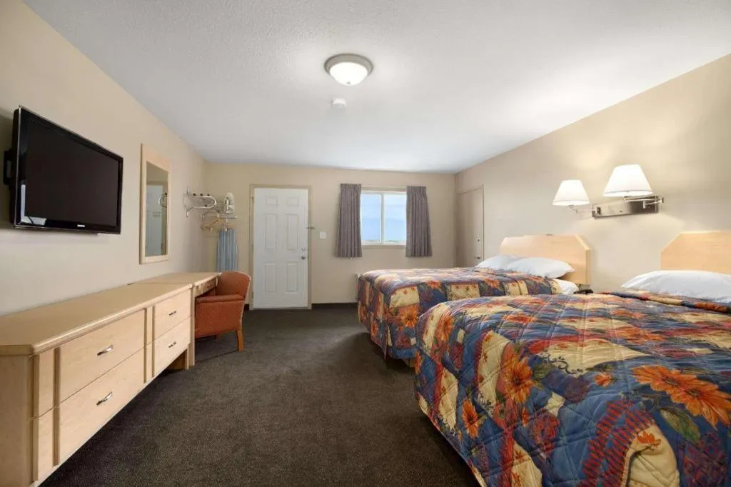 Bed in Thriftlodge Moose Jaw