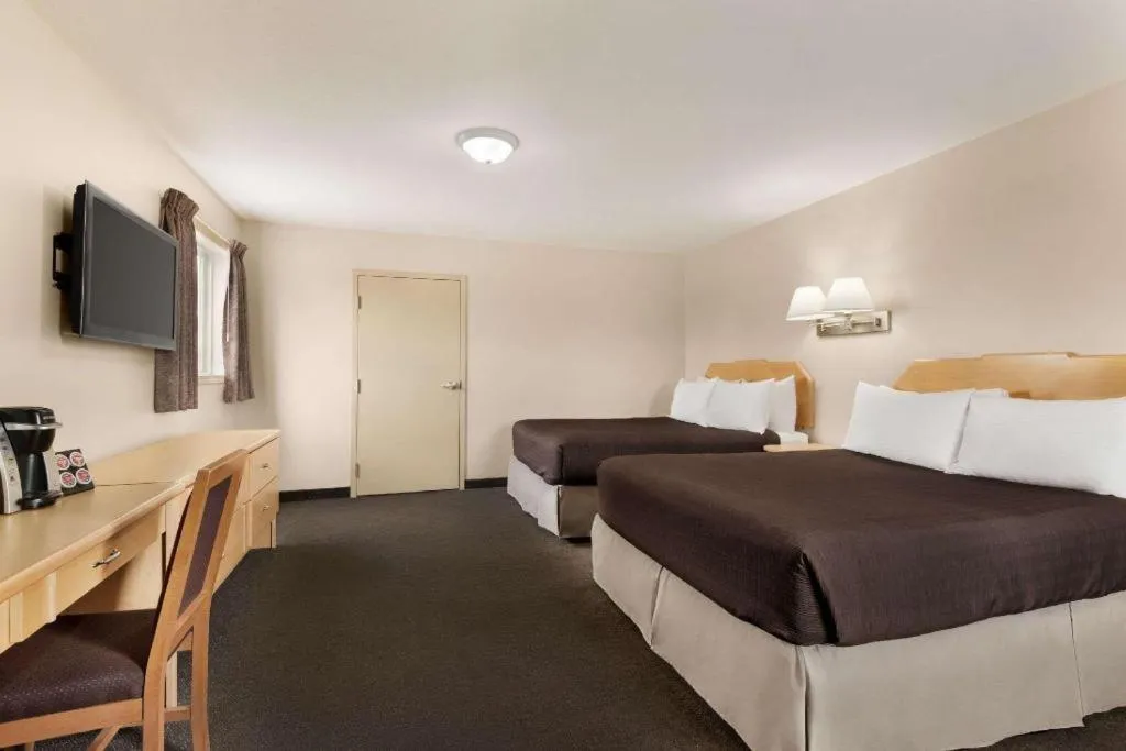 Bed in Thriftlodge Moose Jaw