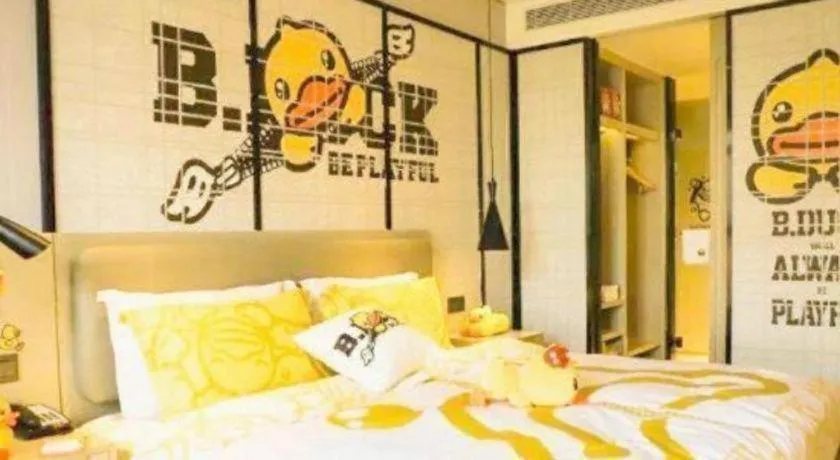 Bed in Echarm Hotel Qionghai Wanquan River