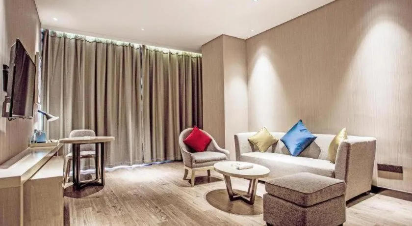 Bed in Echarm Hotel Qionghai Wanquan River