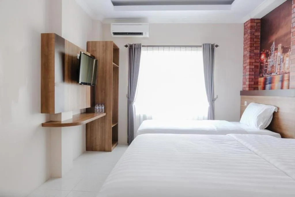 Bed in Noura Guest House Syariah