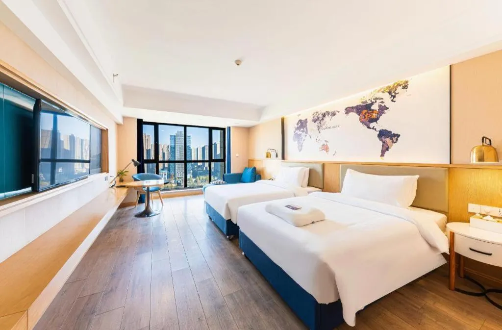 Bed in Kyriad Marvelous Hotel·Xi'an North High-speed Railway Station