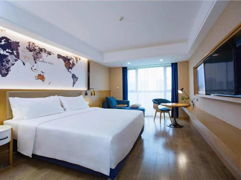 Bed in Kyriad Marvelous Hotel·Xi'an North High-speed Railway Station