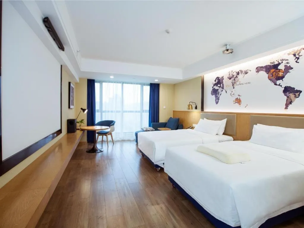 Bed in Kyriad Marvelous Hotel·Xi'an North High-speed Railway Station