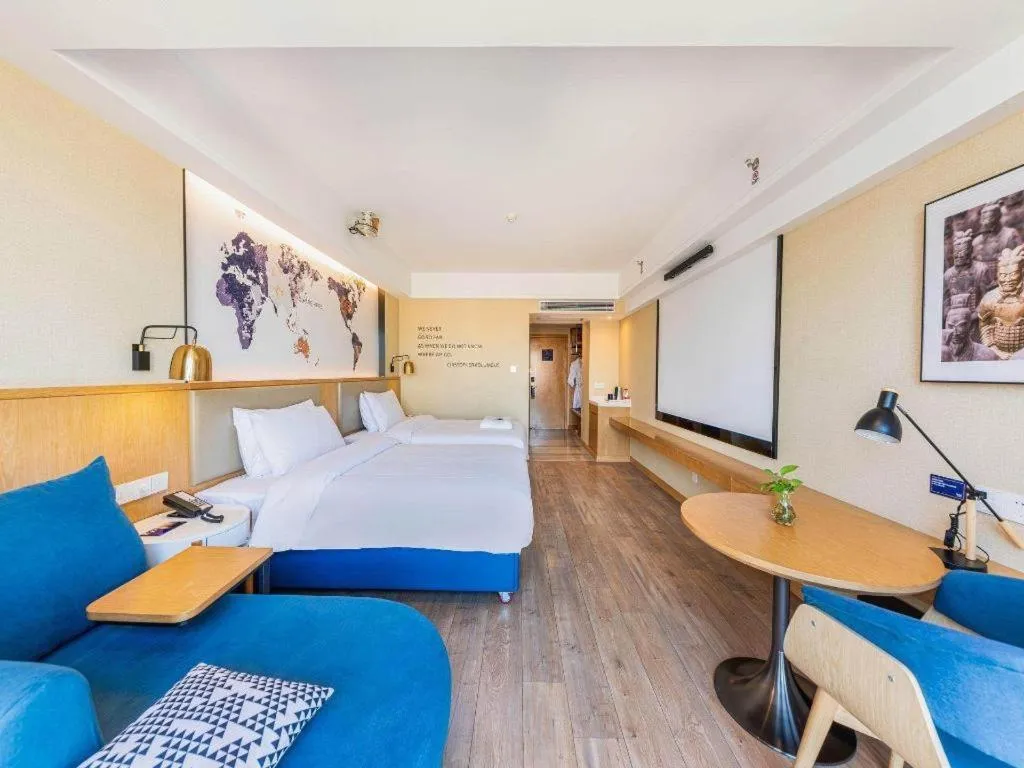 Bed in Kyriad Marvelous Hotel·Xi'an North High-speed Railway Station