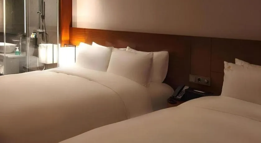 Bed in Top Cloud Hotel Iksan