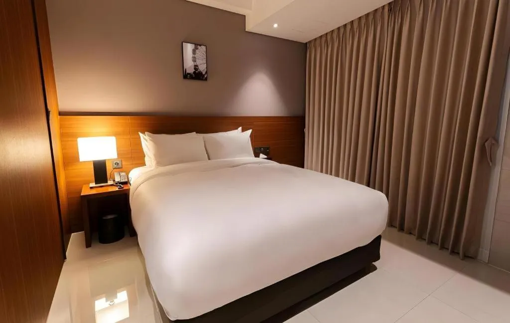 Bed in Top Cloud Hotel Iksan