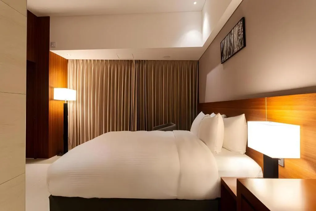 Bed in Top Cloud Hotel Iksan
